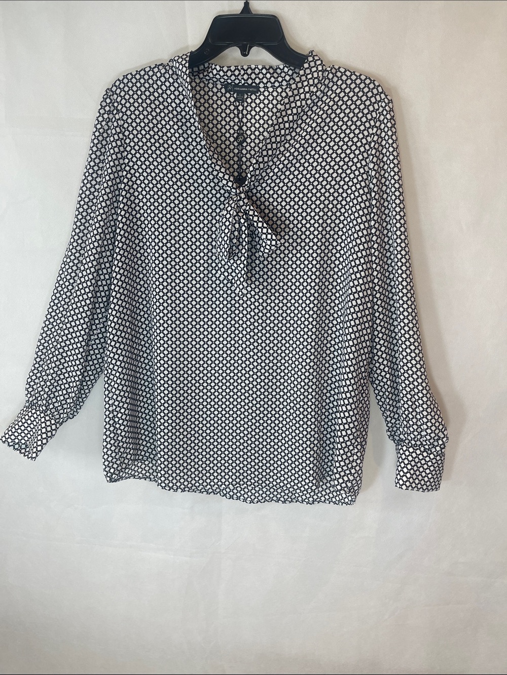 ADRIANNA PAPELL = Black and White Geometric Tie-Neck Blouse.